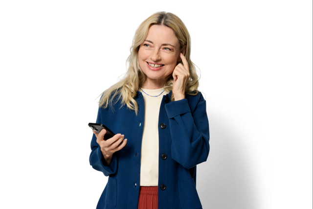 Telefon și Philips HearLink NXT purtat în ureche